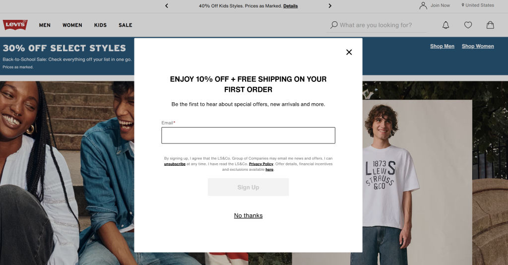 Levi’s homepage showing a welcome pop-up offering 10% off and free shipping on the first order in exchange for an email signup