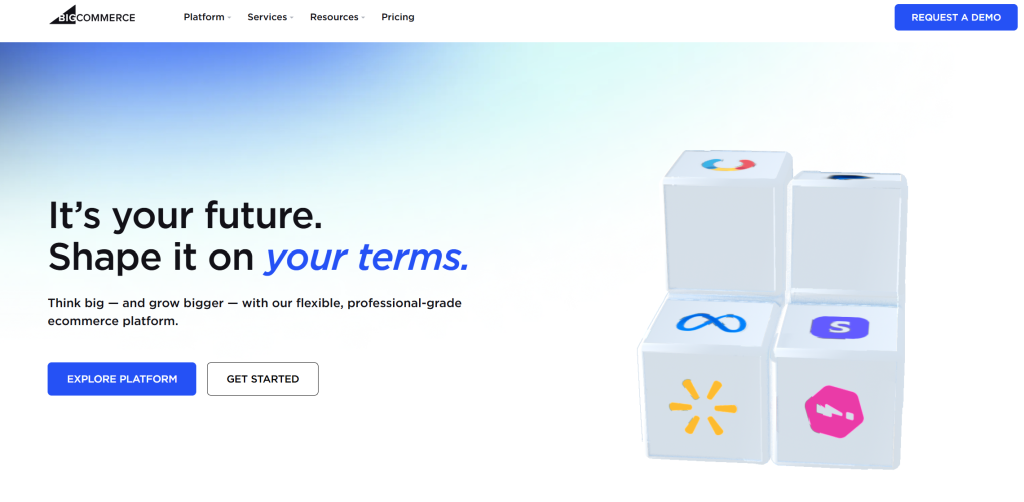 bigcommerce-home - Store Owner Tips BigCommerce homepage with tagline “Shape it on your terms” and visual icons for platform integrations like Meta, Google, and Amazon.