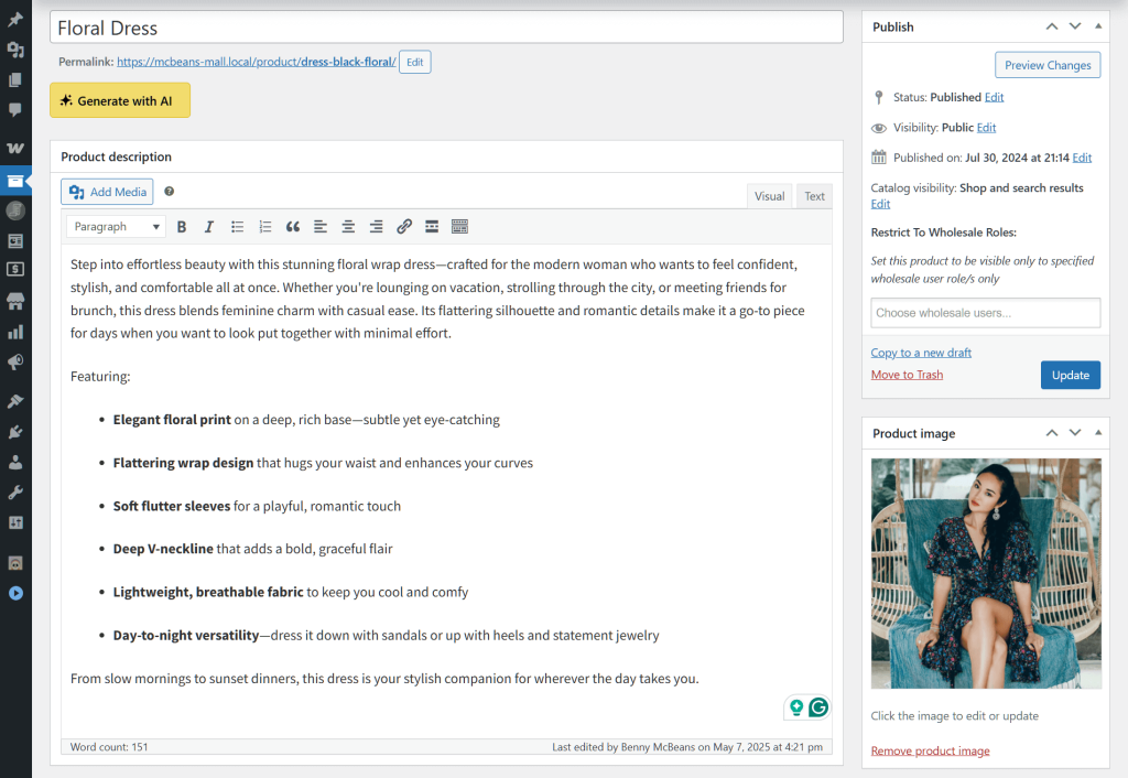 Woman wearing a dark floral wrap dress sits on a woven chair, posing relaxed in a sunlit, bohemian-styled setting.