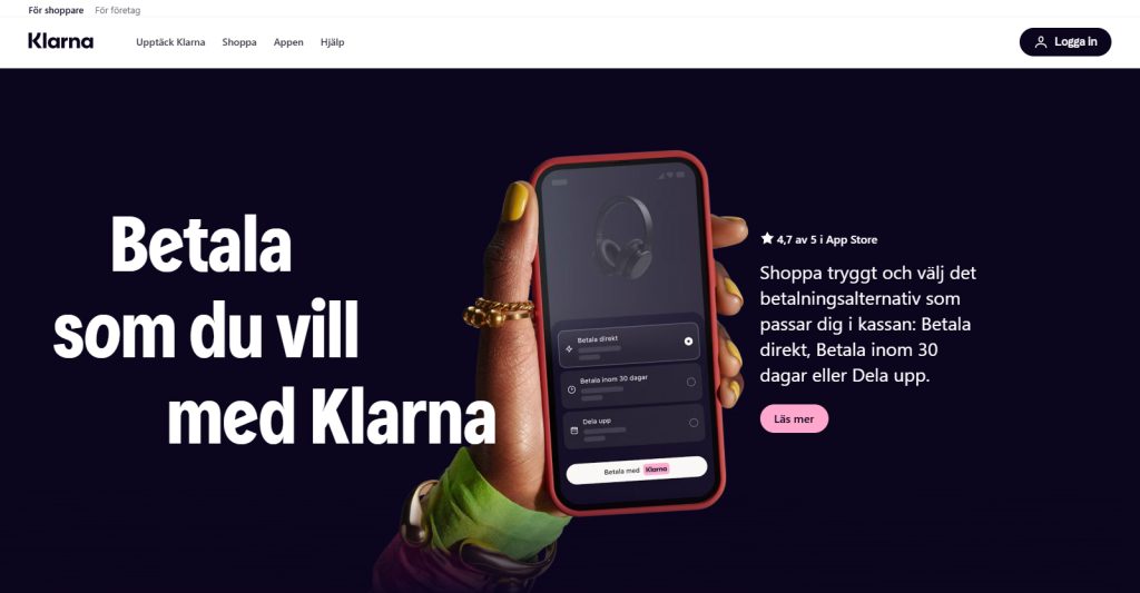 Hand holding smartphone displaying Klarna app payment options against a dark purple background, promoting flexible checkout choices and secure in-app payments.