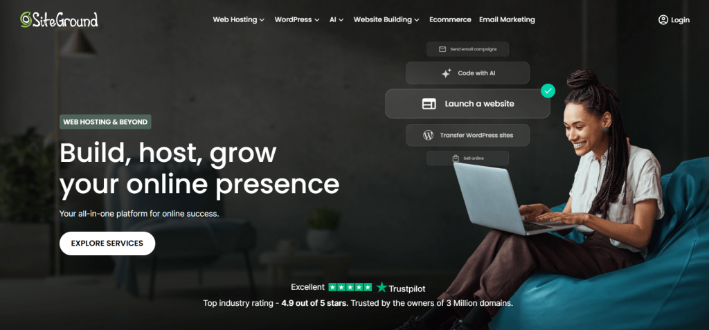 Smiling woman seated on a teal beanbag working on a laptop, promoting building and hosting websites against a dark, modern homepage backdrop.